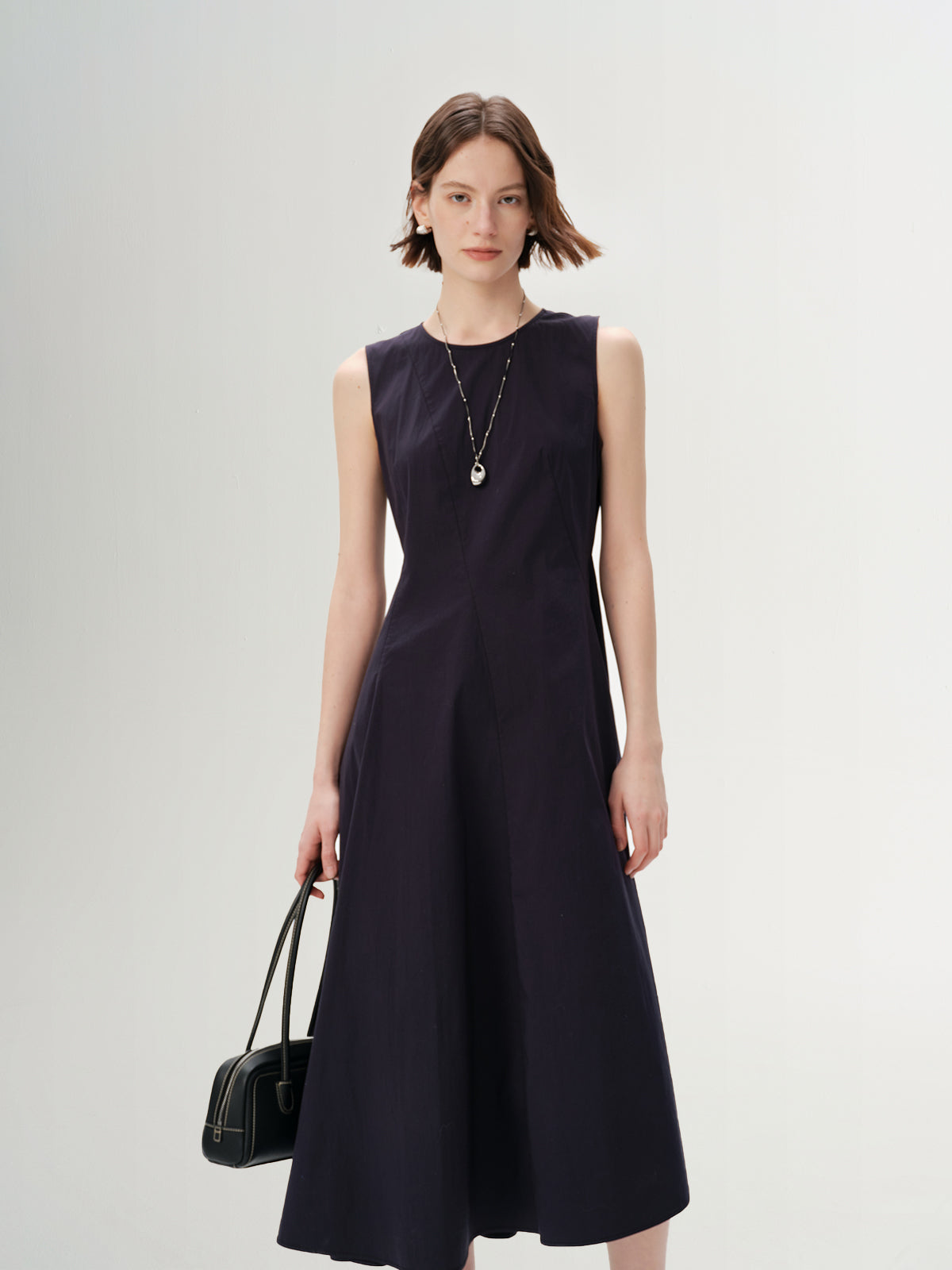 Sleeveless Drape-Neck Sculpted Dress